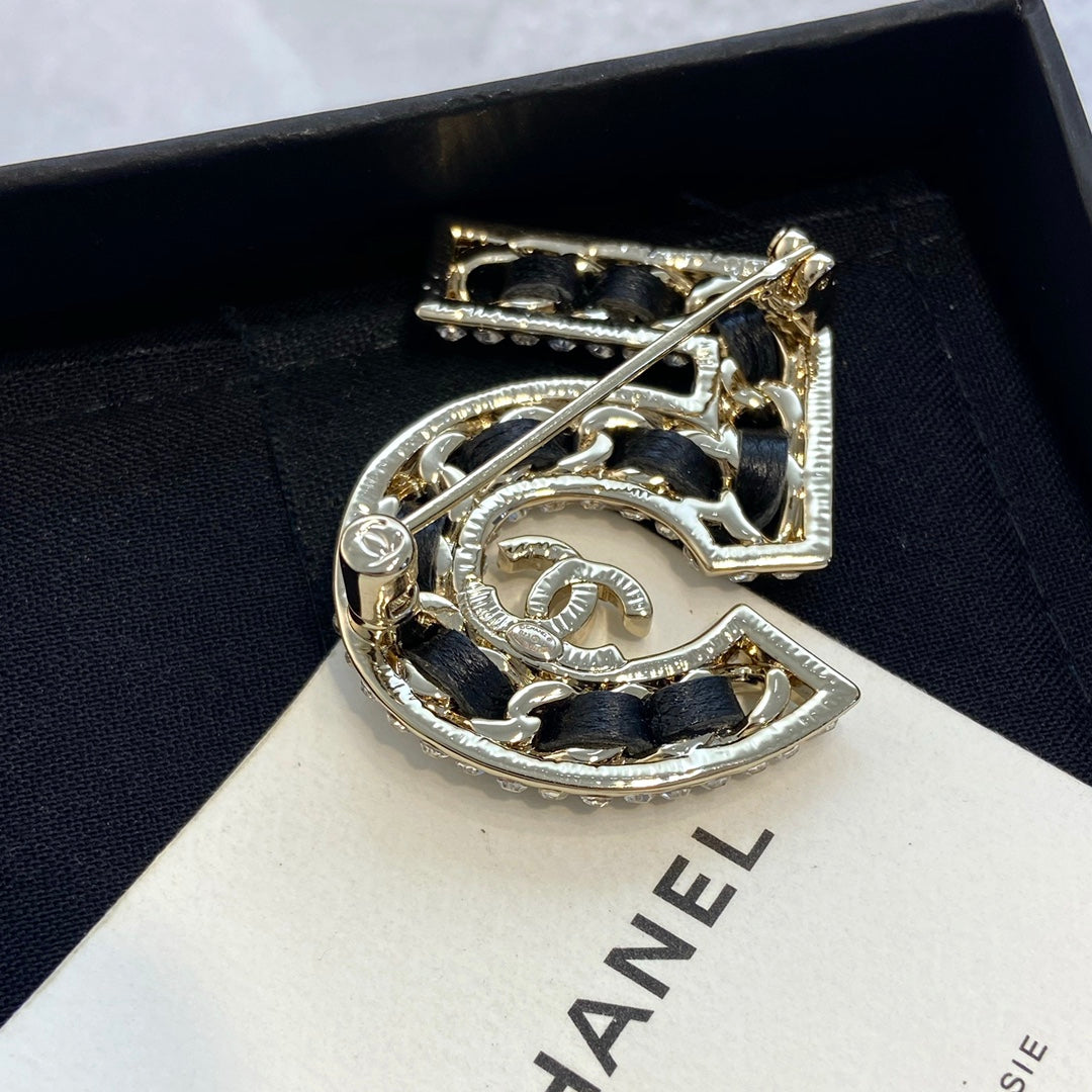 Chanel Number 5 Brooch